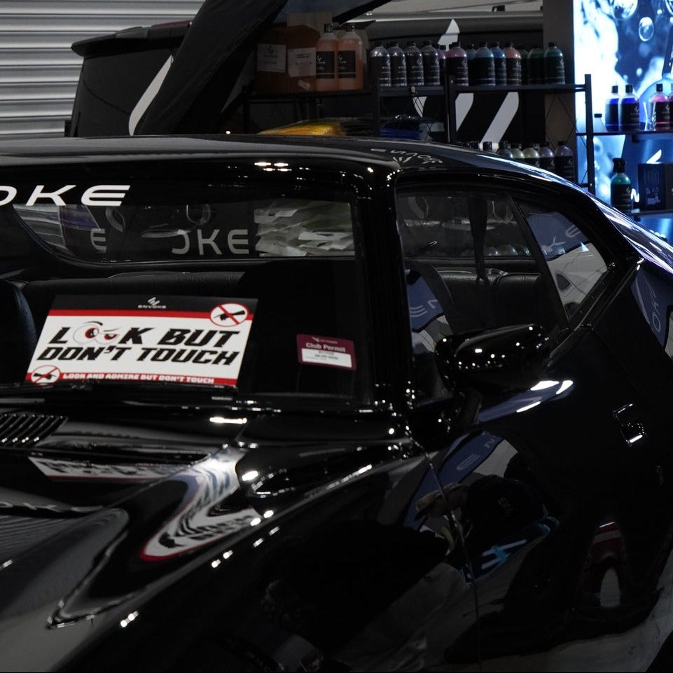 Envoke “Look But Don’t Touch" Sign